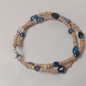 Hand Crafted Blue Beaded Bracelet with Intricate Design